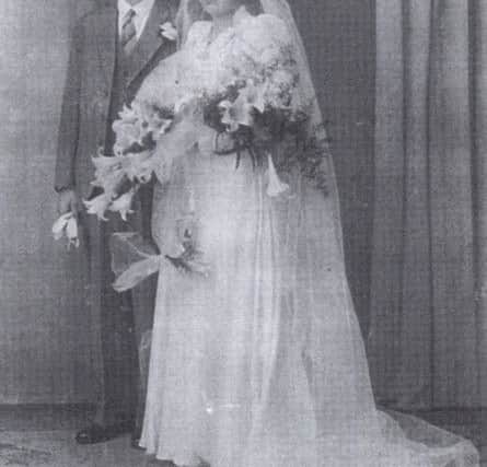 MARRIED JUST FIVE WEEKS Laurence and Iris Pearce nee Kane on their wedding day.