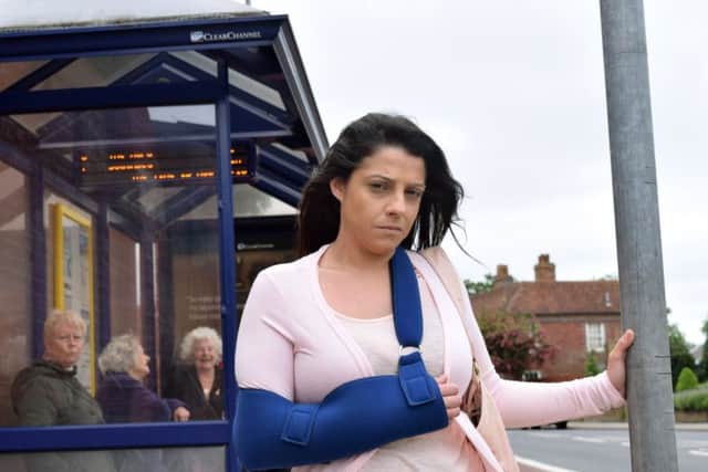 Zoe Hydes at the bus stop in London Road, Hilsea