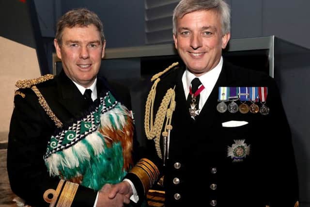 The 1st Sea Lord Admiral Sir Philip Jones, right, and Rear Admiral John Martin in front of the PiuPiu