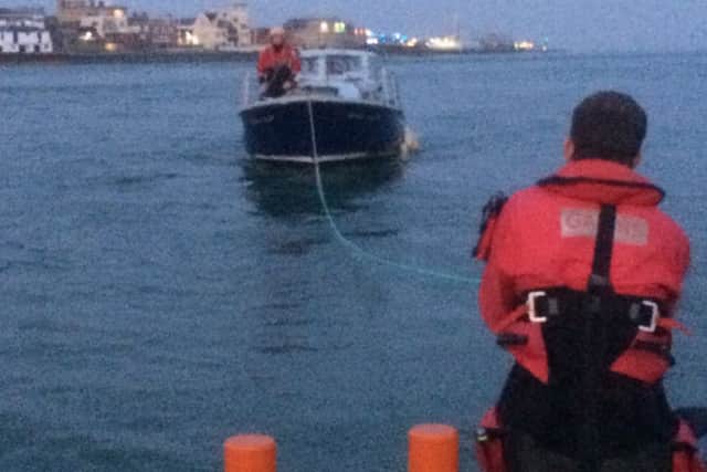 Rescuers grom Gafirs towed a broken down vessel away from a busy shipping lane in The Solent on Sunday evening