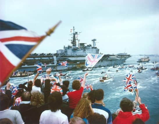 EXTRAORDINARY HMS Hermes returns to Portsmouth after the 1982 Falklands war