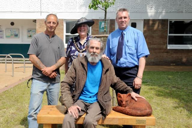 Back from left, Chris Bain, sculptor, the Mayor of Havant Faith Ponsonby, Stagecoach driver Craig Cockram and (front) owner of Missy the cat Richard McCormick. Picture: Sarah Standing (160807-1927)