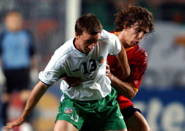 Former Pompey striker David Connolly in action for Republic of Ireland against Spain at the 2002 World Cup