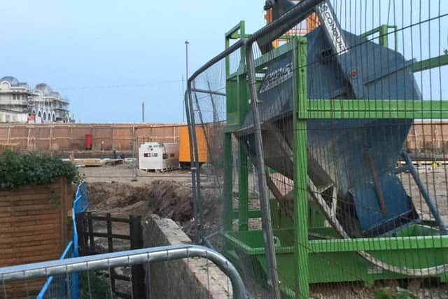 Work from McCarthy & Stone going into a Southsea residents garden