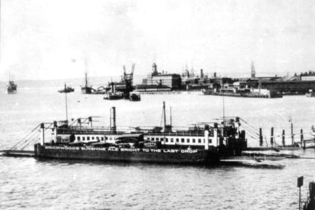 A floating bridge  awaits more trade at Point, Old Portsmouth.