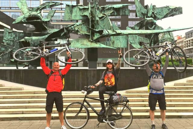 From left, Stuart Paine, Robert Coulter and Rob Shaw at the finish in Rotterdam