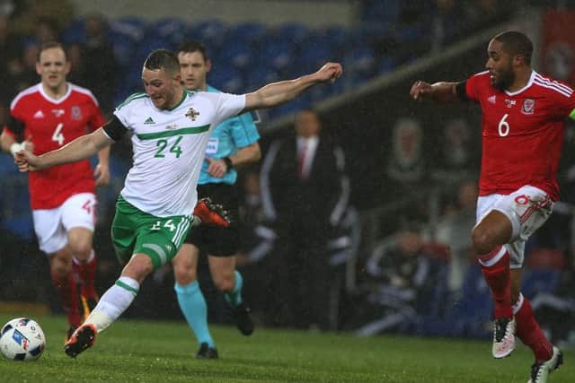 Ashley Williams, right in action against Northern Ireland Picture: Brian Little