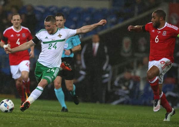 Ashley Williams, right in action against Northern Ireland Picture: Brian Little