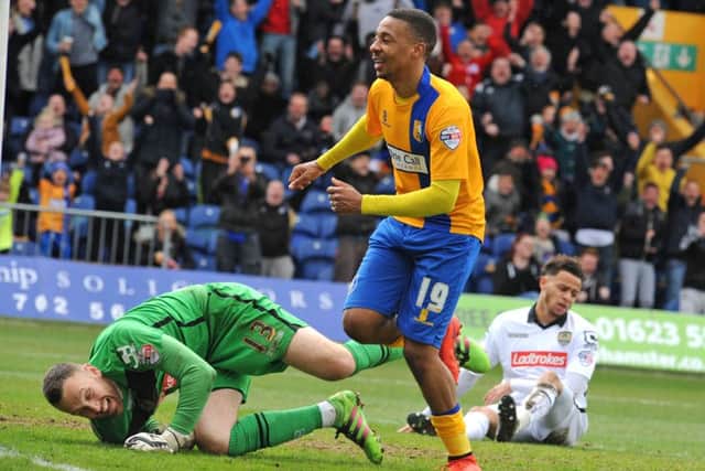 Reggie Lambe scores for Mansfield against Notts County last season Picture: Anne Shelley