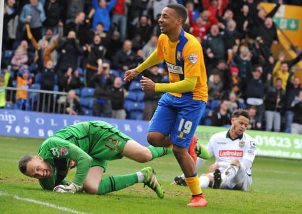 Reggie Lambe scores for Mansfield against Notts County last season  Picture: Anne Shelley