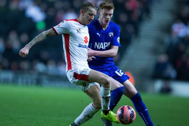 Carl Baker in action for MK Dons against Chesterfield Picture: James Williamson