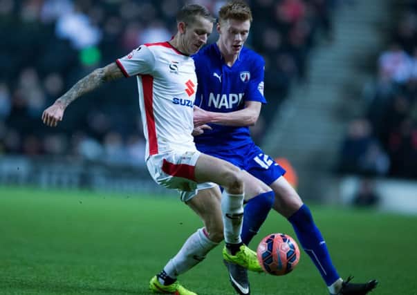 Carl Baker in action for MK Dons against Chesterfield Picture: James Williamson