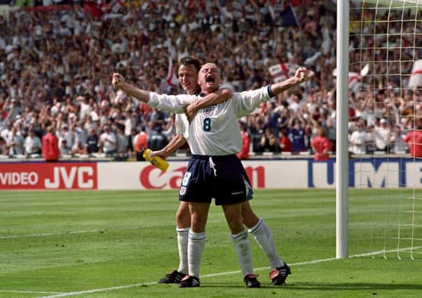 Paul Gascoigne celebrating his goal with Teddy Sheringham in the Euro 96 clash against Scotland, at Wembley.
Picture: Neil Munns/PA Wire.