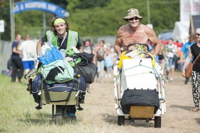 Festival-goers arrive at the Isle of Wight Festival, in Seaclose Park, Newport, Isle of Wight. Picture: David Jensen/PA Wire
