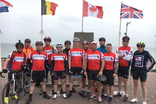 SAILORS from HMS Atherstone cycled 84 miles to honour the fallen of D-Day.