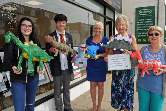 (Left to right) Tamzin Allen (15), Billy Green (16), with estate agent Tina Othlen and organisers Jackie Buckley and Pauline Corrigan