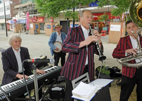 The Featherstone Jazzmen play in the precinct.
Picture Ian Hargreaves (160829-6)