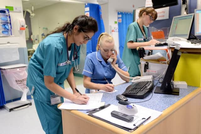 Doctors and nurses at work in A&E