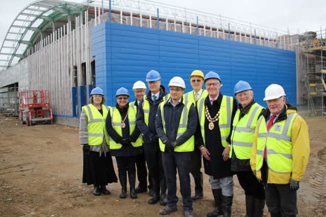 From left, Cllr Sue Bell, mayoress of Fareham Anne Ford, Cllr Trevor Cartwright, Cllr Sean Woodward, Jon Chew from Balfour Beatty, Cllr David Swanbrow, Mayor of Fareham Cllr Mike Ford, Cllr Brian Bayford and Cllr Roger Price pictured at the leisure centre in March