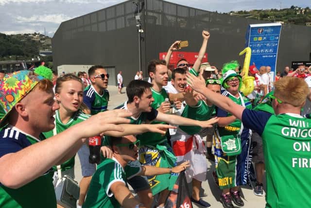 Northern Ireland fans make the most of their first matchday experience at Euro 2016 - despite a 1-0 defeat to Poland