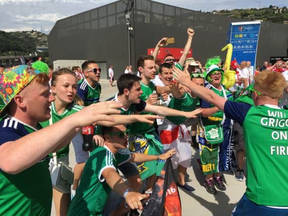 Northern Ireland fans make the most of their first matchday experience at Euro 2016 - despite a 1-0 defeat to Poland