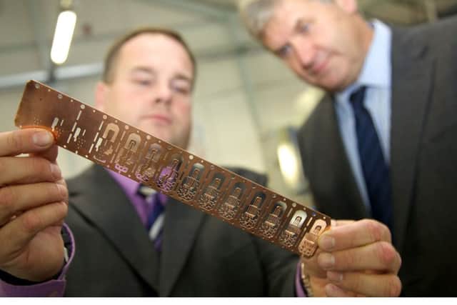 Left to Right Adrian Haller MD at Bruderer UK and Paul McGuinness Operations Director at Harwin Plc