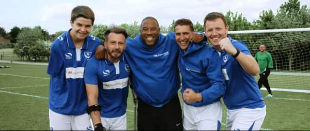 Former England star John Barnes with players from Portsmouth Amputee FC. From left, Michael Beel, Roger Whitehouse, John Barnes, Gary Marheineke and Mike Gays