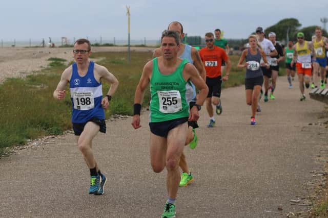 Stubbington's Andy Simpson and Pete Collins powering ahead. Picture: David Brawn