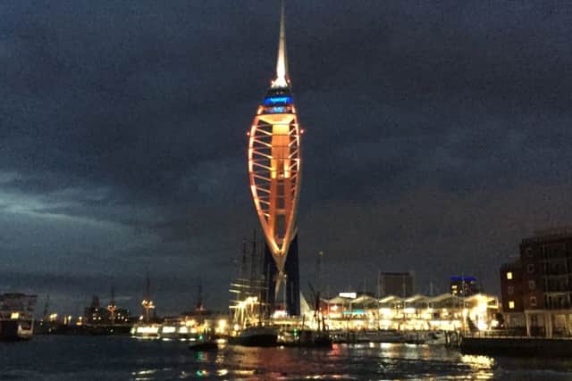 The Spinnaker Tower is illuminated on a cycle of red, blue, green and yellow tonight as a tribute to those killed in the Orlando Pulse nightclub