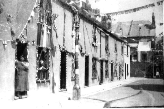 Dressed overall we see Smiths View,Southsea, decorated for  King George V's Silver.Jubilee, 1935