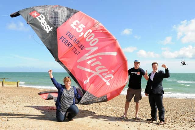 From left, Clare Satchwell from the Hayling Ferry Trust, Dan Charlish from the Virgin Kitesurfing Amarda and Mark Coates from the trust Picture: Sarah Standing (160886-2334)