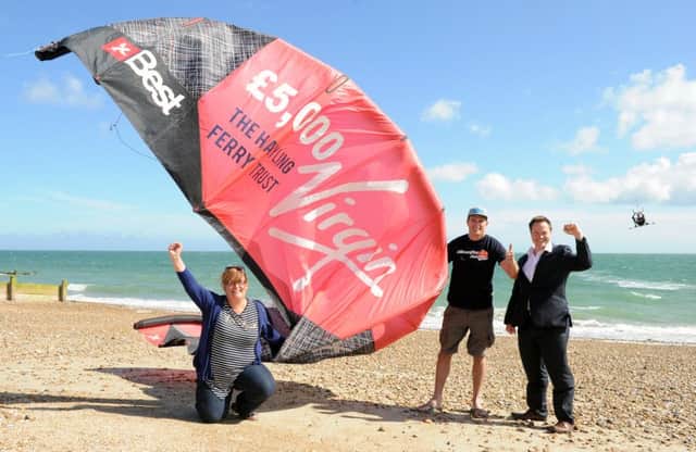 From left, Clare Satchwell from the Hayling Ferry Trust, Dan Charlish from the Virgin Kitesurfing Amarda and Mark Coates from the trust Picture: Sarah Standing (160886-2334)