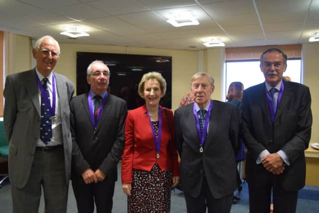 From left, new honorary aldermen David Swanbrow, David Norris, Marian Ellerton, John Bryant and Tim Knight