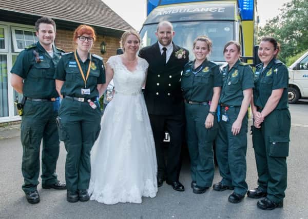 Alice Green with ambulance staff - who helped after Alice's mum collapsed during her wedding