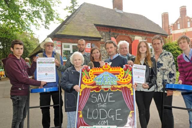 Supporters of The Arts Lodge and Park Cafe in Victoria Park, Portsmouth  with, at the front, Pat Arnold and manager Mark Lewis Picture: Ian Hargreaves (160836-2)