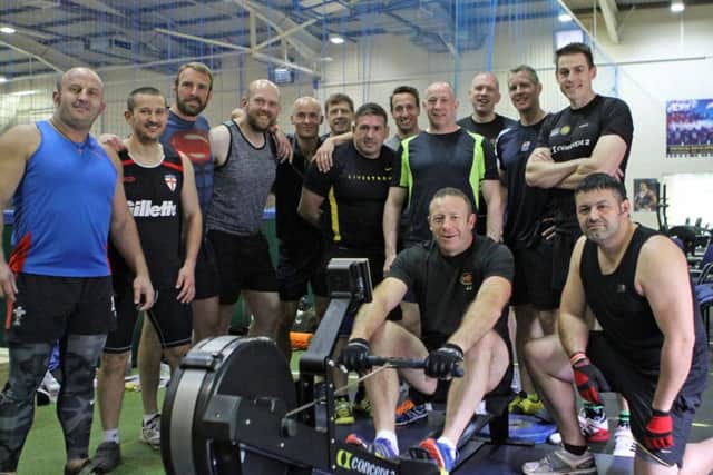A team made of serving members and veterans from across the navy, army, Royal Air Force and the Sub7 indoor rowing club set a new world and British record