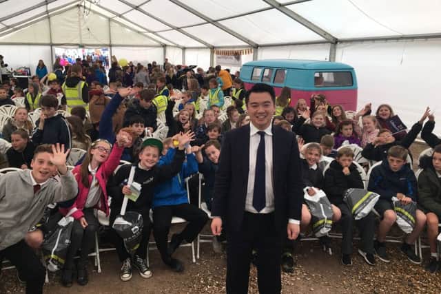 Havant MP Alan Mak with schoolchildren on the first day of the Hayling Island Virgin Armada kitesurfing festival
Picture: James Gradwell