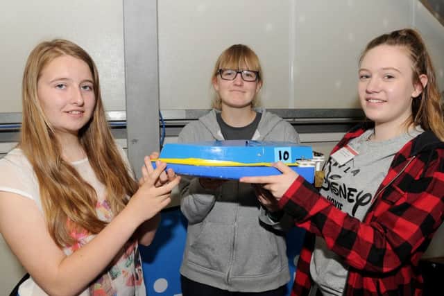 From left, Kaylee Atkinson, 13, Molly Bruce, 14, and Sophie McCulloch, 13, from Horndean Technology College.
Picture: Sarah Standing (160892-2816)