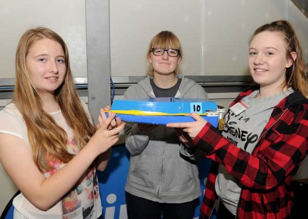 From left, Kaylee Atkinson, 13, Molly Bruce, 14, and Sophie McCulloch, 13, from Horndean Technology College. 

Picture: Sarah Standing (160892-2816)