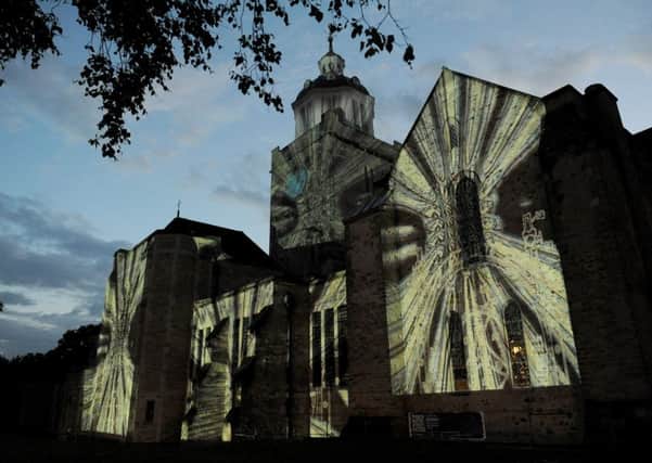 Luxmuralis used the cathedral as a backdrop to a light show last night Picture: Sarah Standing (160894-4068)