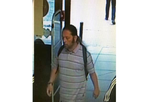 This picture has been released by police after a 28-year-old woman wearing a hijab was racially abused in the Wilko store in Portsmouth