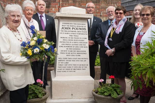 It's 250 years since charitable cobbler John Pounds was born in Portsmouth and people gathered at the John Pounds Church to commemorate him. From left, Patrica Isted, Barbara McLeod, Mike Enness, Stephen Crowther, Chris Bloxsom, Erica Davies, Kathleen Durning, Sandie O'Neil   Picture: Keith Woodland