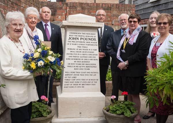 It's 250 years since charitable cobbler John Pounds was born in Portsmouth and people gathered at the John Pounds Church to commemorate him. From left, Patrica Isted, Barbara McLeod, Mike Enness, Stephen Crowther, Chris Bloxsom, Erica Davies, Kathleen Durning, Sandie O'Neil   Picture: Keith Woodland