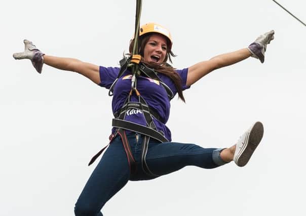 Kelle Russell on the zip wire Picture: Keith Woodland