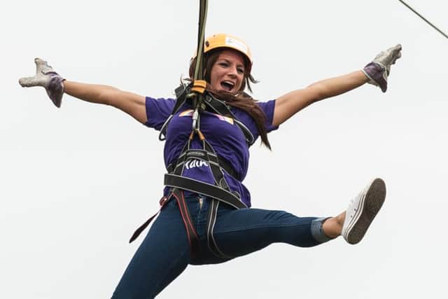 Kelle Russell on the zip wire Picture: Keith Woodland