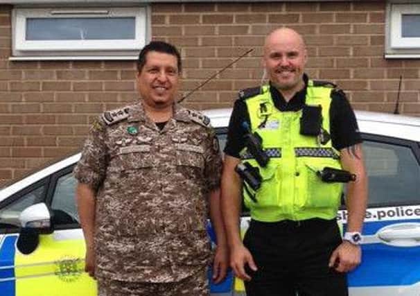A picture tweeted by Waterlooville police of Abraham from Saudi Arabia on patrol