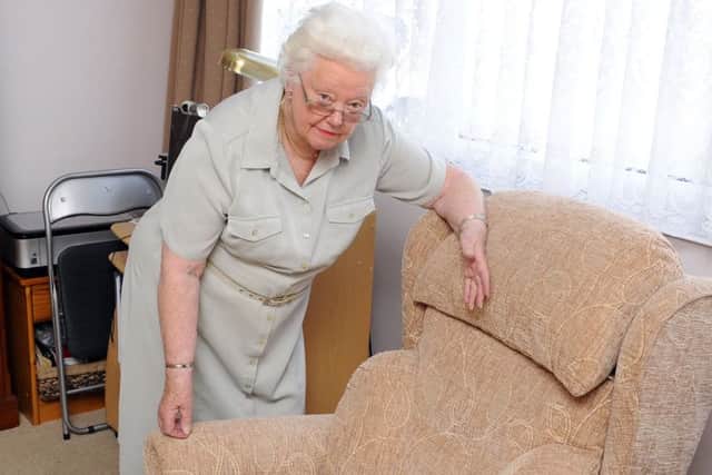 Betty Miller, 82, from Farlington, who has had problems with her rise and recline chair Picture: Malcolm Wells (160620-1554)
