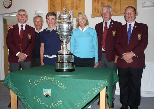 Past and present Corhampton captains with Scott Gregory and the British Amateur trophy. Picture: Andrew Griffin