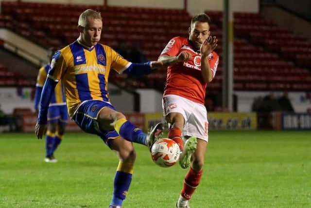 Walsall's Milan Lalkovic, right