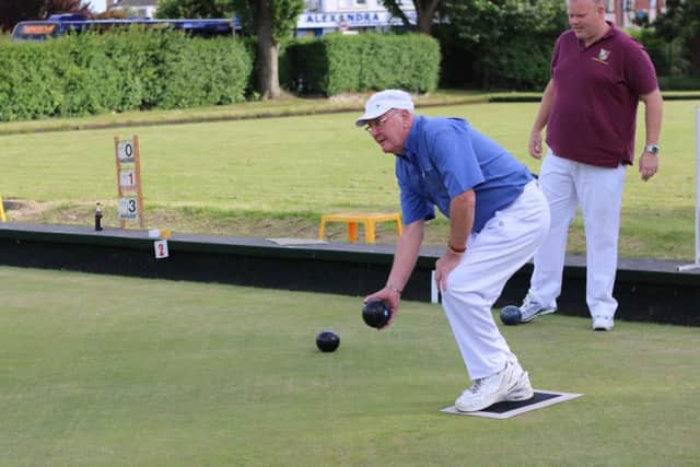 Terry Smith bowls for Vospers
